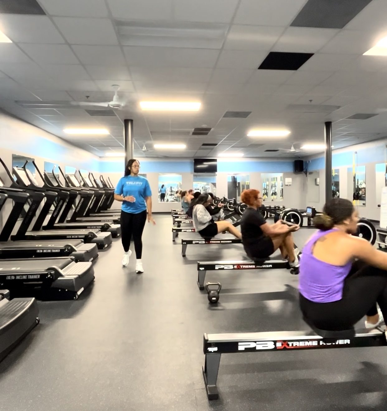 Asya coaching a group class